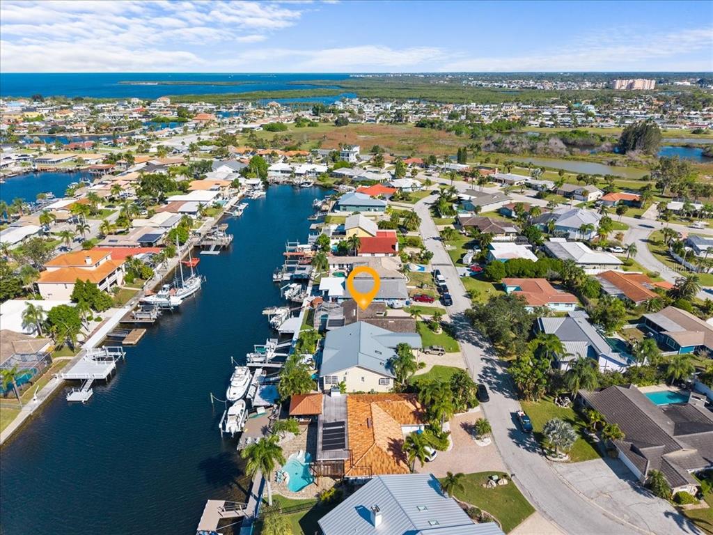 5028 Ensign Loop New Port Richey, FL 34652 - Photo 74 of 76 an aerial view of residential building with outdoor space