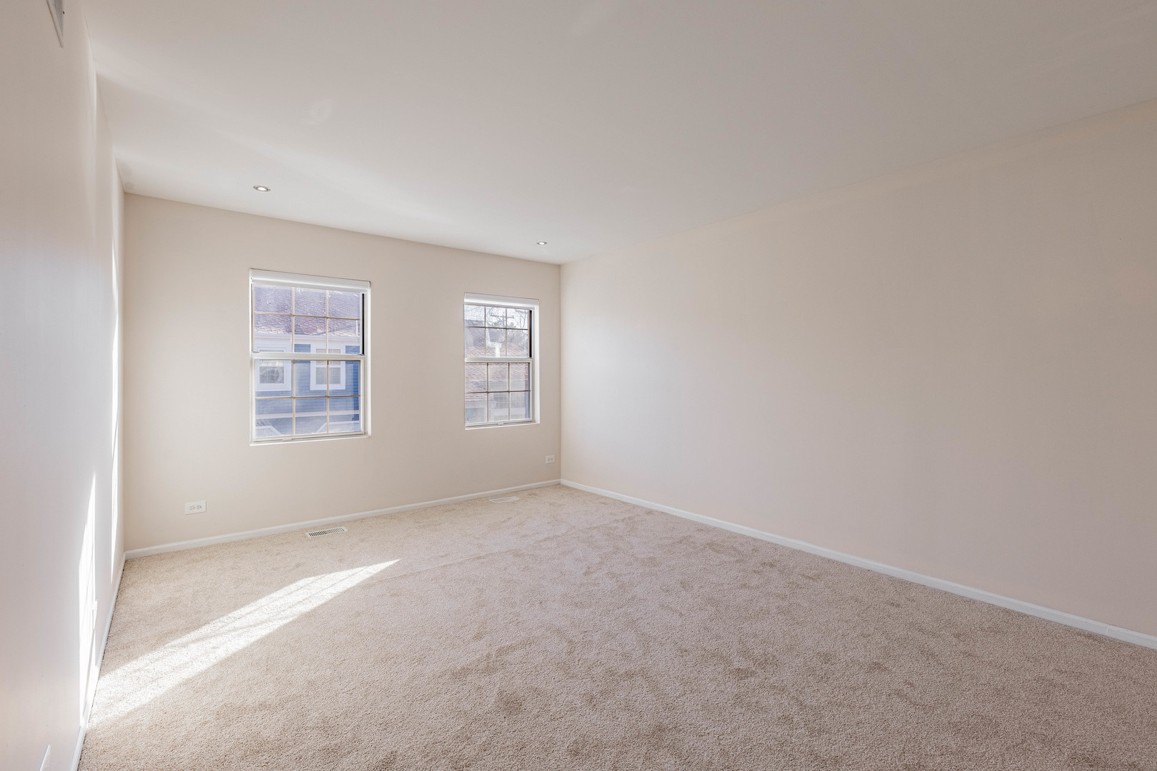 237 Acorn Drive Streamwood, IL 60107 - Photo 12 of 31 an empty room with windows