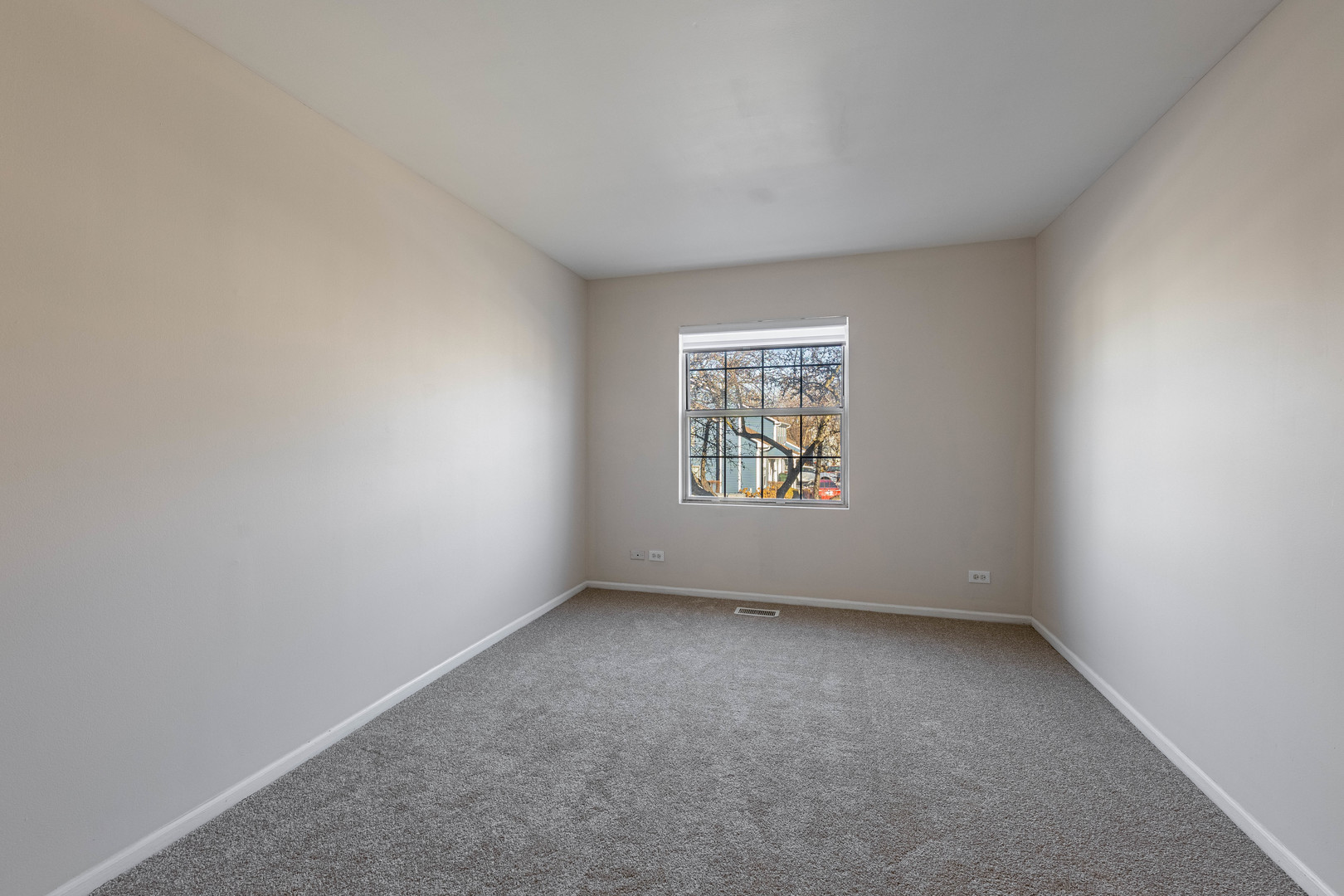 237 Acorn Drive Streamwood, IL 60107 - Photo 16 of 31 an empty room with windows