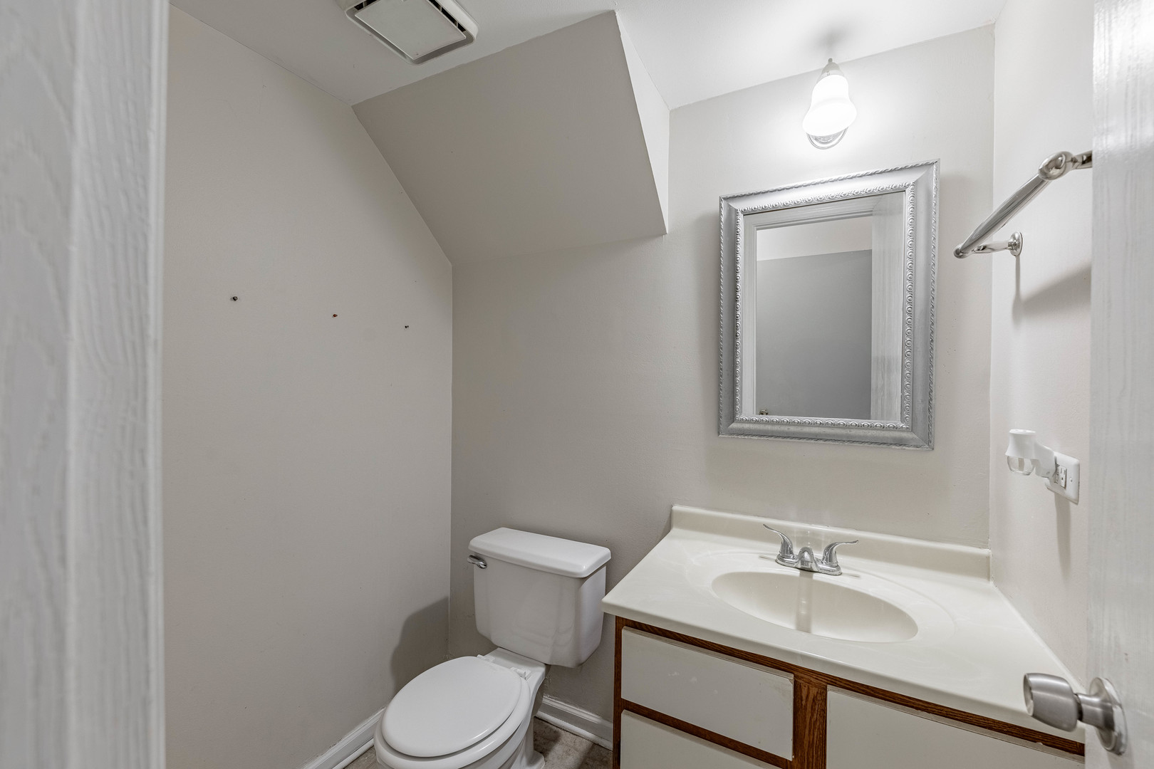 237 Acorn Drive Streamwood, IL 60107 - Photo 10 of 31 a bathroom with a sink and a toilet