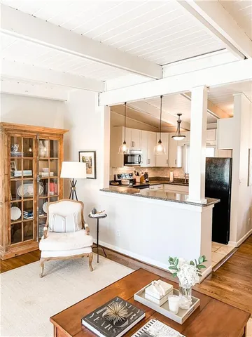 a living room with a couch and a table