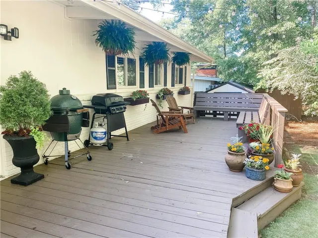 a backyard of a house with seating space