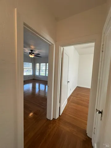 a room with appliances a sink and a window