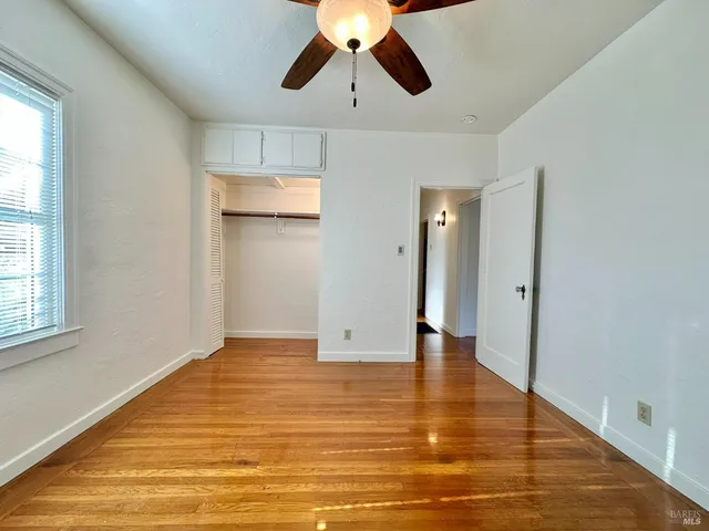 a bathroom with a tub sink and window