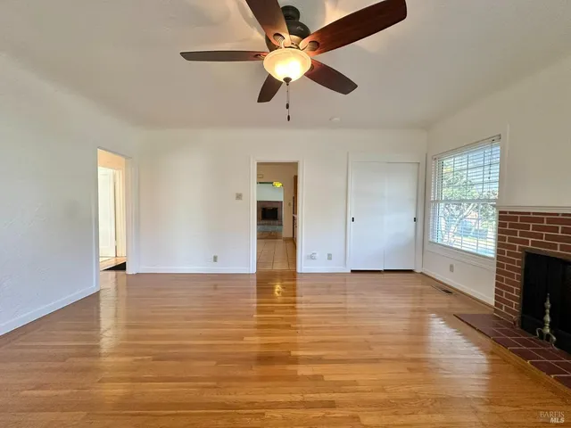 a kitchen with cabinets and appliances