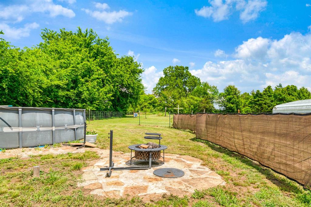 735 1st Southwest Detroit, TX 75436 - Photo 25 of 26 a view of a swimming pool with a patio