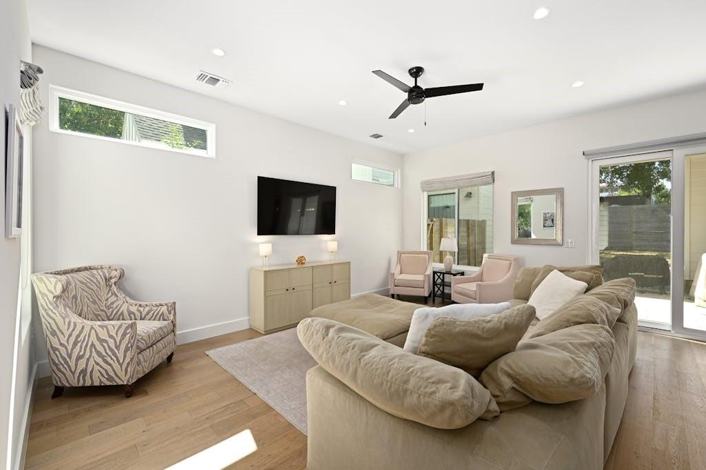5212 Huisache Street, Unit 2 Austin, TX 78751 - Photo 5 of 30 Living area featuring healthy amount of natural light, light wood-style flooring, recessed lighting, and ceiling fan