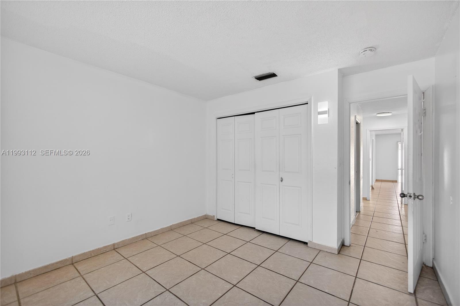 13471 Southwest 99th Terrace Miami, FL 33186 - Photo 35 of 44 a view of a closet area in a room