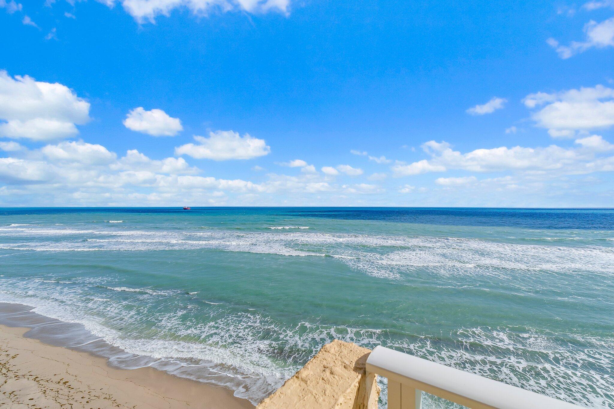 Undisclosed Address Singer Island, FL 33404 - Photo 12 of 77 a view of a lake from a yard