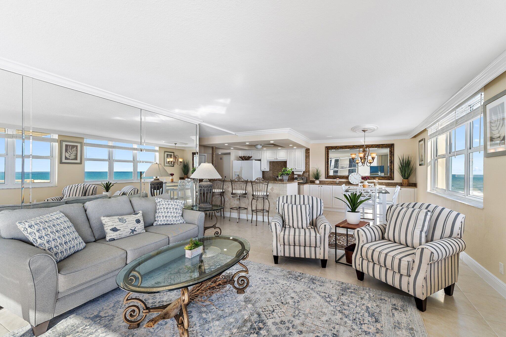 Undisclosed Address Singer Island, FL 33404 - Photo 19 of 77 a living room with furniture and a table