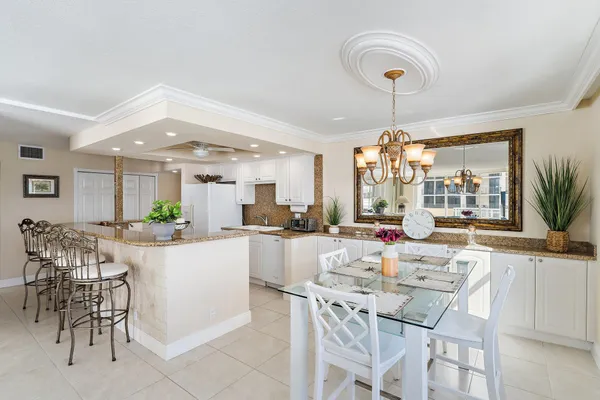 a hallway with sliding door and wooden floor
