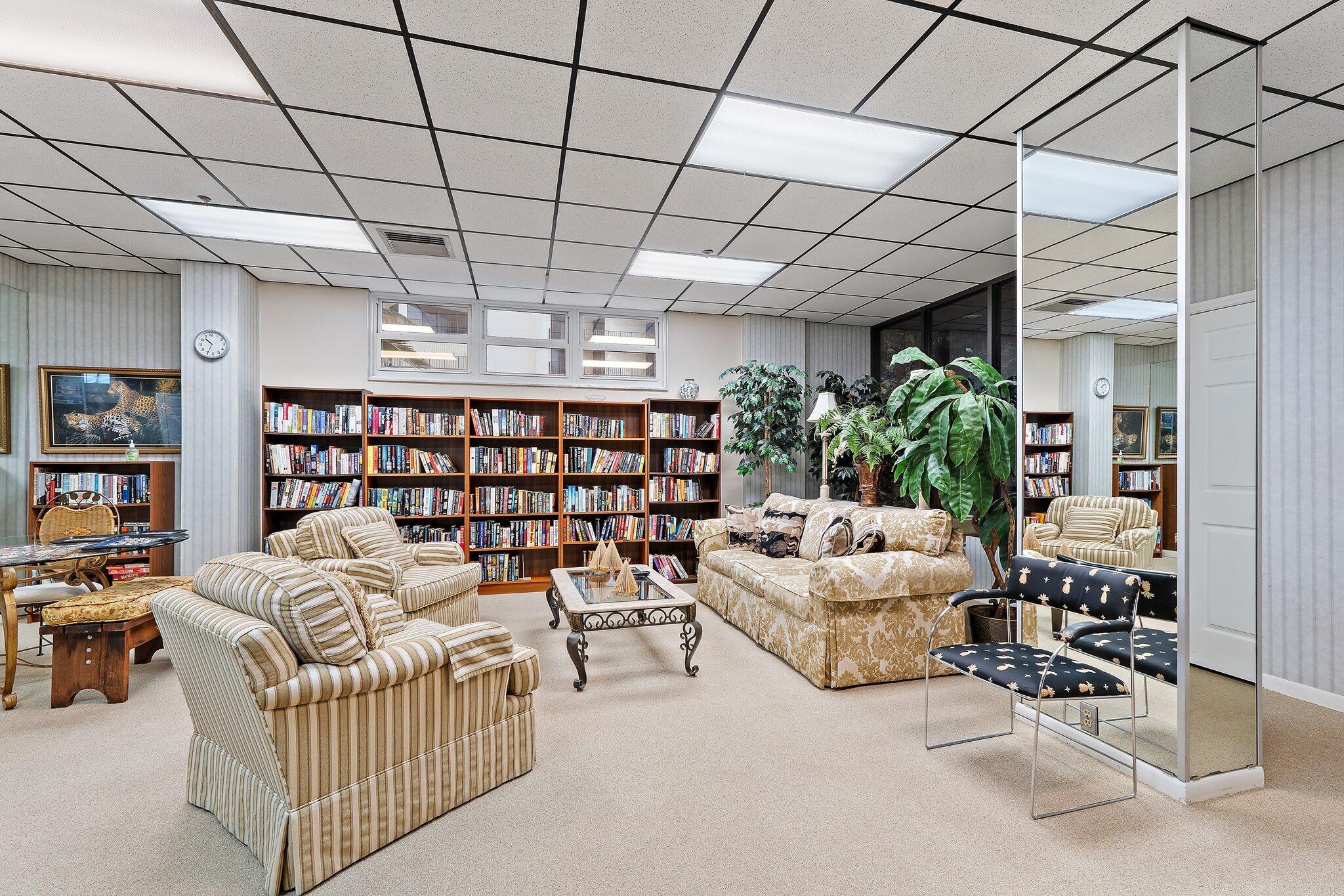 Undisclosed Address Singer Island, FL 33404 - Photo 47 of 77 a living room with furniture a rug and a chandelier