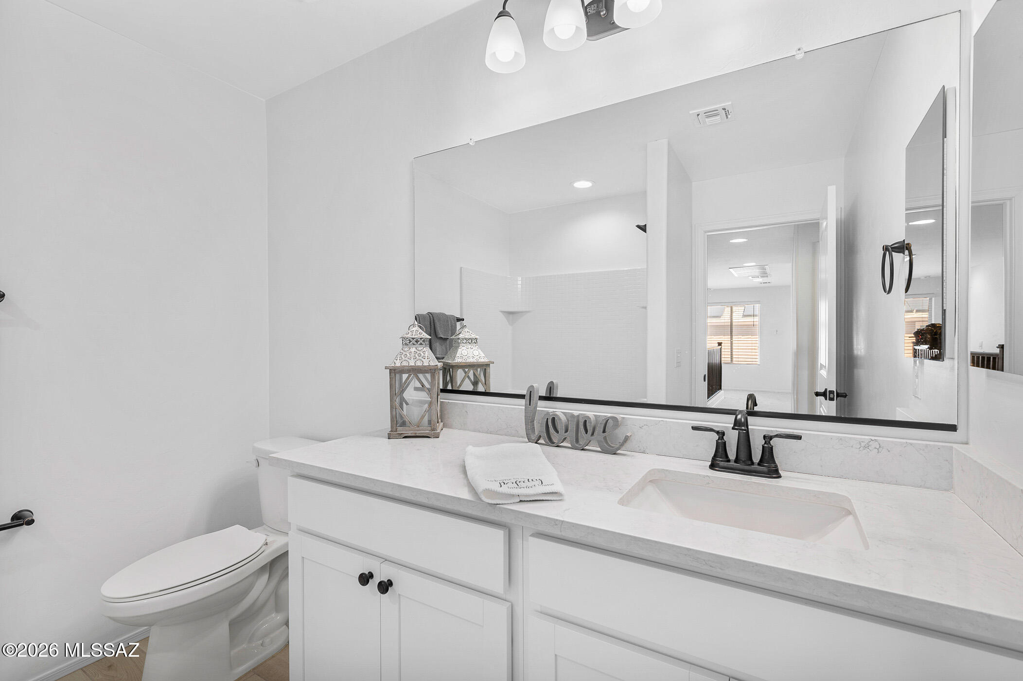 12092 East Ryscott Circle Vail, AZ 85641 - Photo 40 of 49 a bathroom with a sink and a toilet