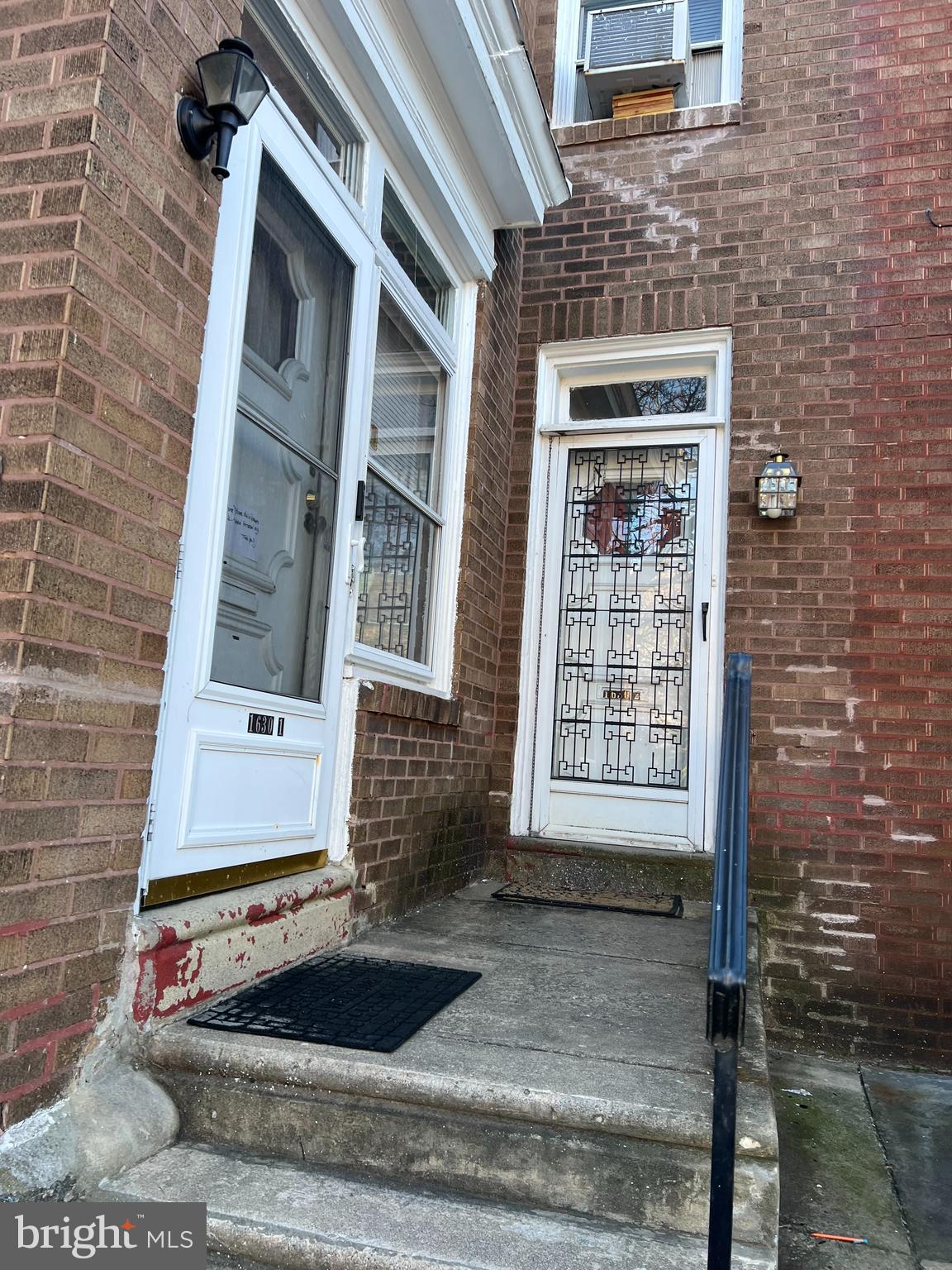 1630 Conlyn Street, Unit 2 Philadelphia, PA 19141 - Photo 2 of 10 a front view of a house with stairs