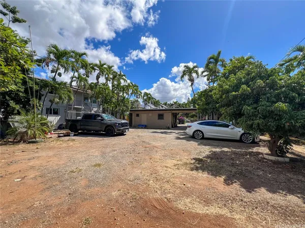 a view of a car parked in front of a house
