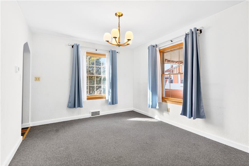 1008 Schweitzer Road McKeesport, PA 15135 - Photo 21 of 43 a view of an empty room with a window
