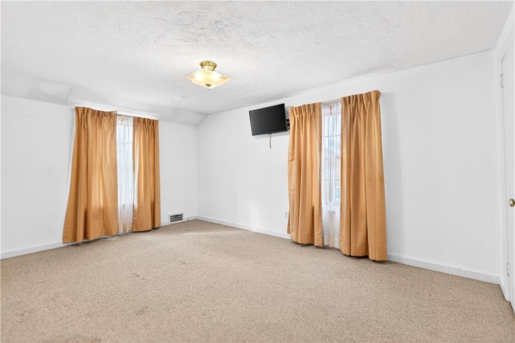 1008 Schweitzer Road McKeesport, PA 15135 - Photo 29 of 43 an empty room with windows