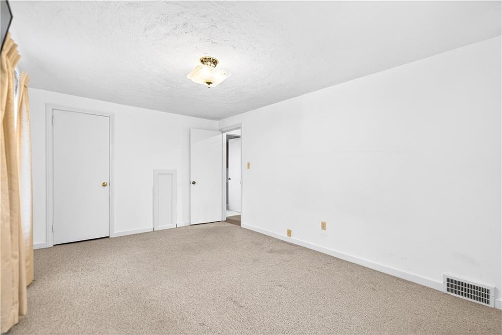 1008 Schweitzer Road McKeesport, PA 15135 - Photo 31 of 43 a view of an empty room