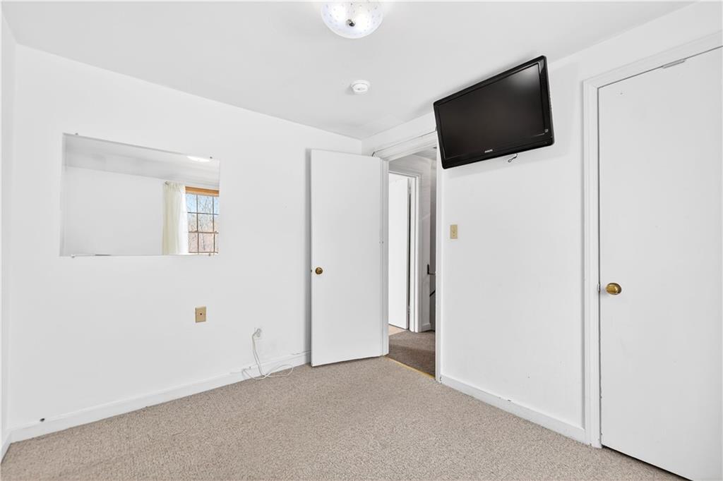 1008 Schweitzer Road McKeesport, PA 15135 - Photo 36 of 43 a view of a livingroom with a flat screen tv