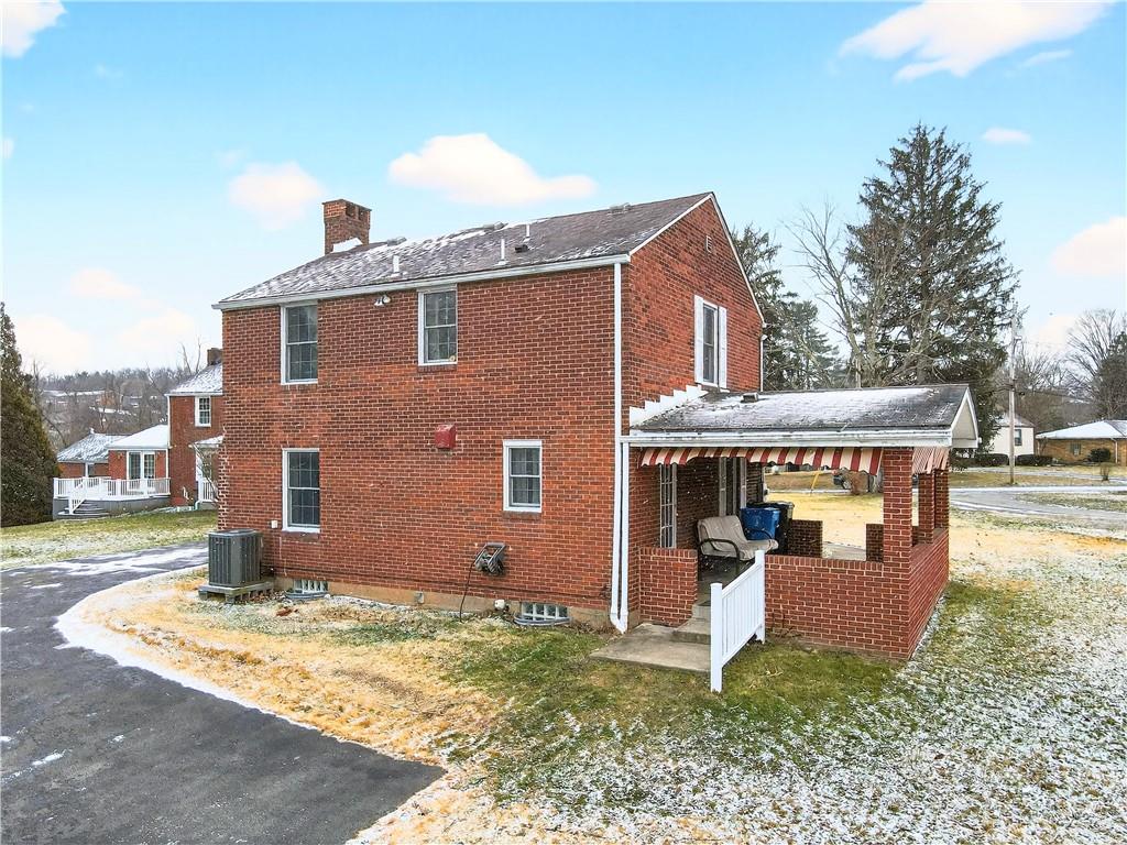 1008 Schweitzer Road McKeesport, PA 15135 - Photo 6 of 43 a view of a house with a yard