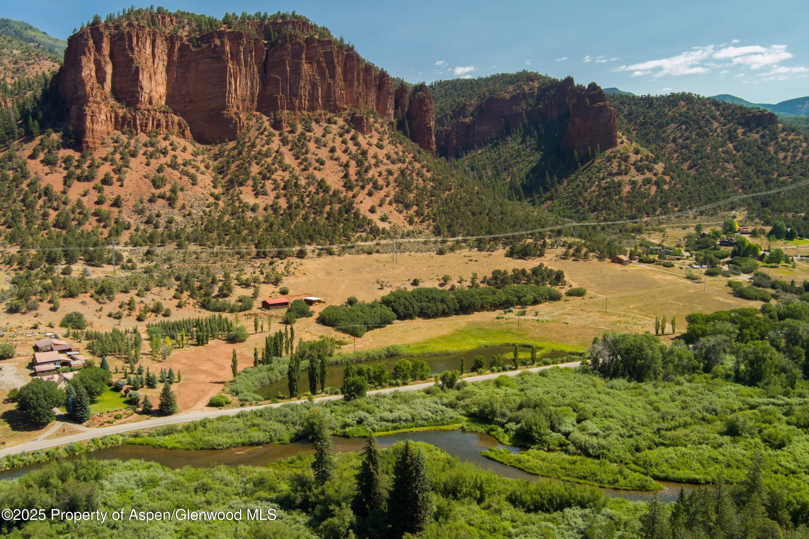 5129 Frying Pan Road Basalt, CO 81621 - Photo 5 of 14 a view of a yard with wooden fence