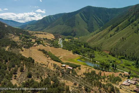 a view of a street with a mountain