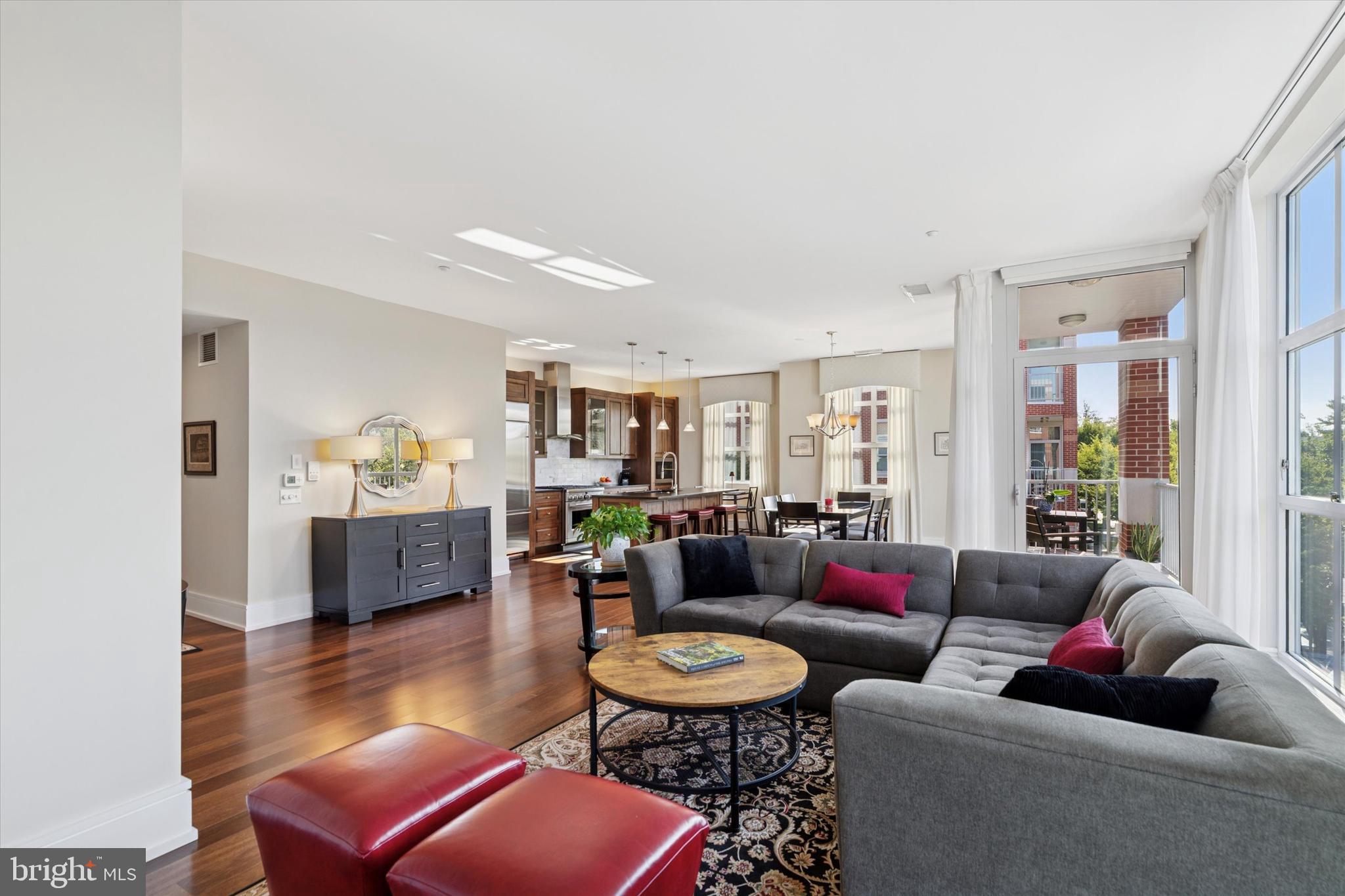 125 Iron Works Way Wayne, PA 19087 - Photo 20 of 32 a living room with furniture and a wooden floor