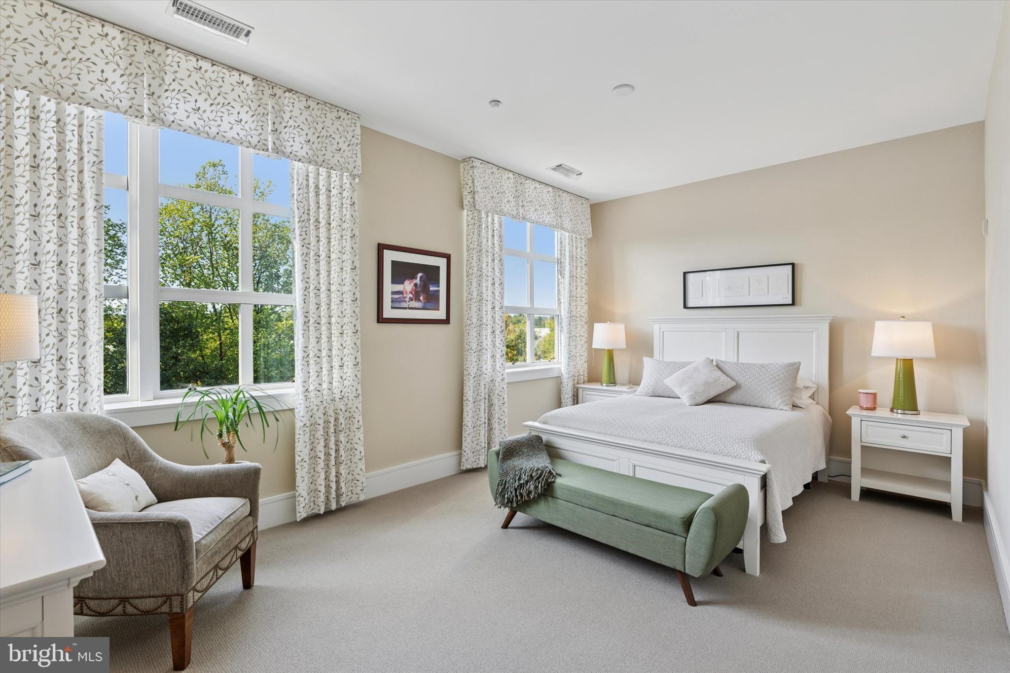 125 Iron Works Way Wayne, PA 19087 - Photo 21 of 32 a bedroom with a bed and a couch