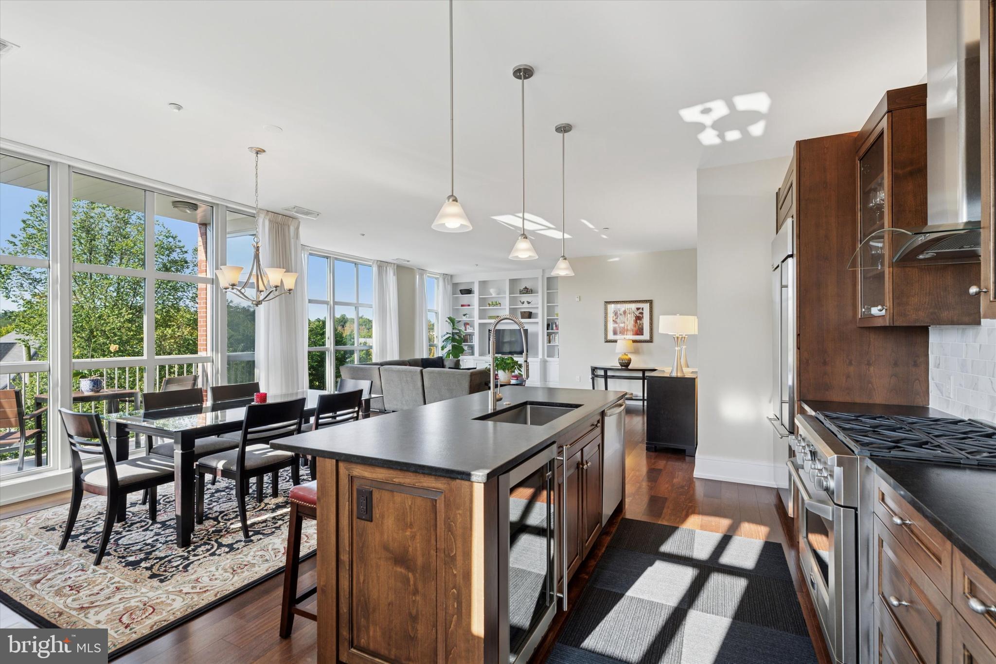 125 Iron Works Way Wayne, PA 19087 - Photo 7 of 32 a kitchen with counter top space appliances and windows