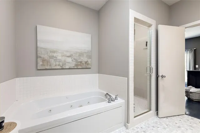 a bathroom with a sink vanity and a mirror