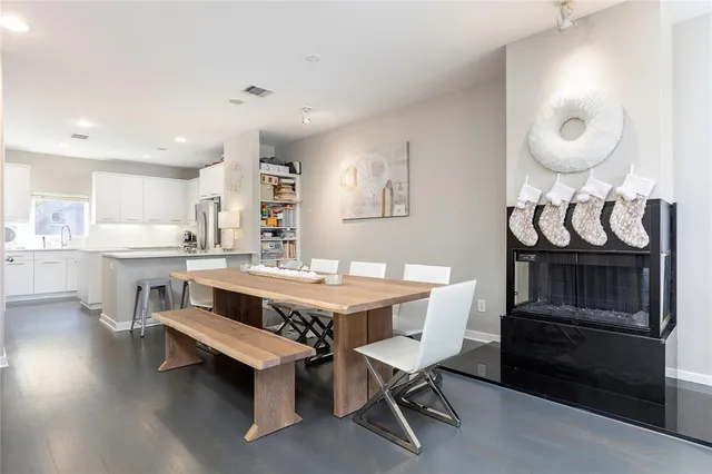 a view of kitchen island with furniture and wooden floor