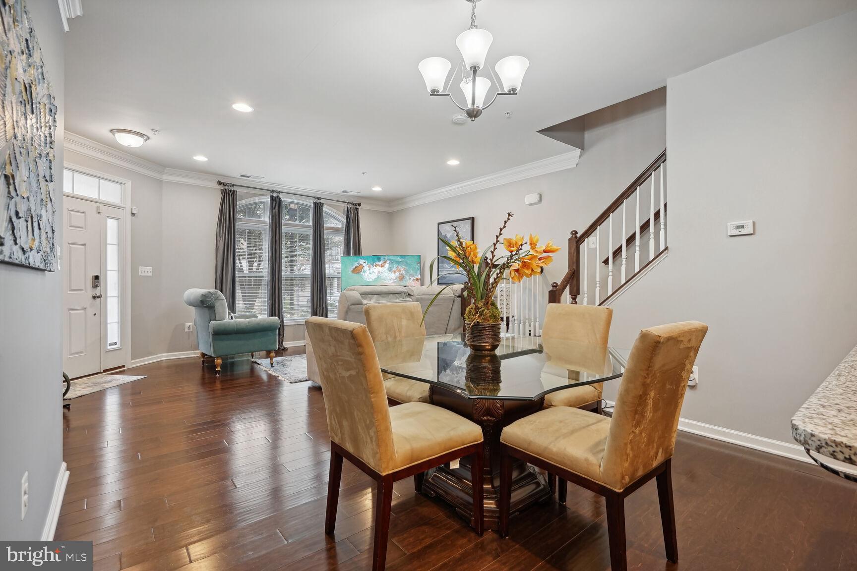 23485 Logans Ridge Terrace Ashburn, VA 20148 - Photo 2 of 13 Dining area open to living room