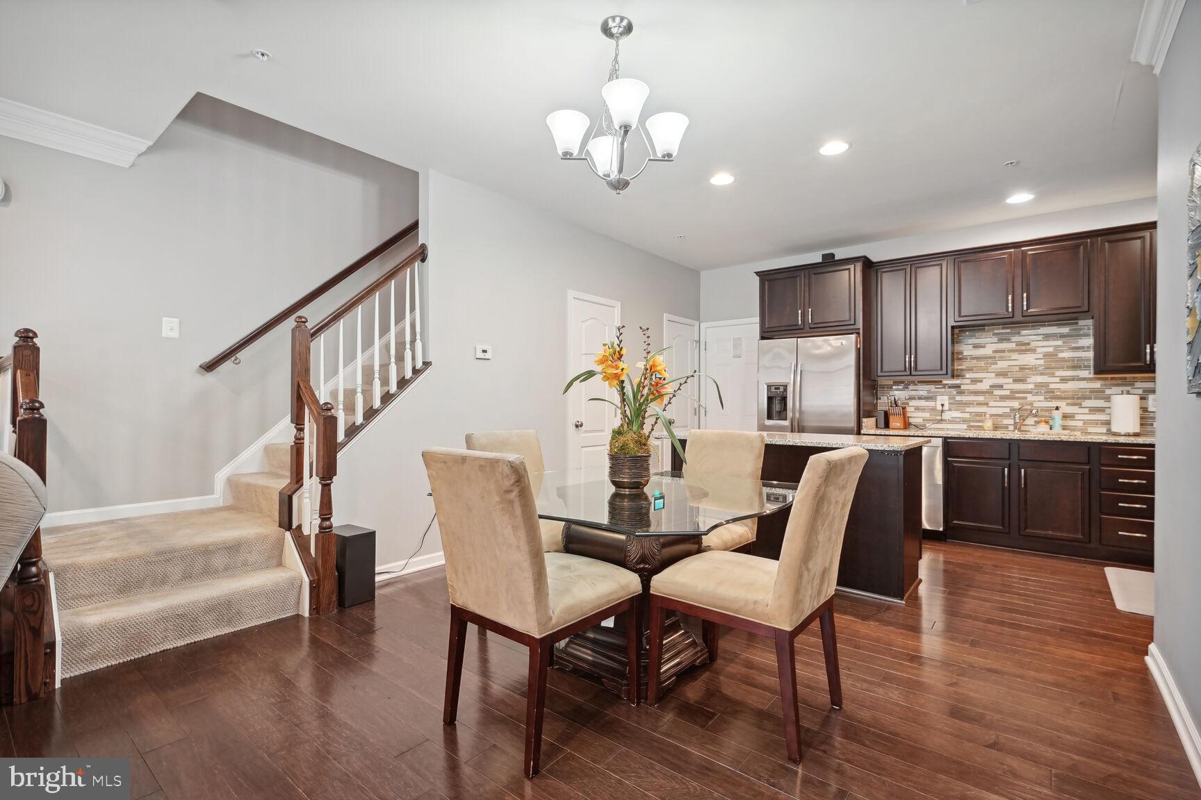 23485 Logans Ridge Terrace Ashburn, VA 20148 - Photo 3 of 13 Dining area with hardwood floors