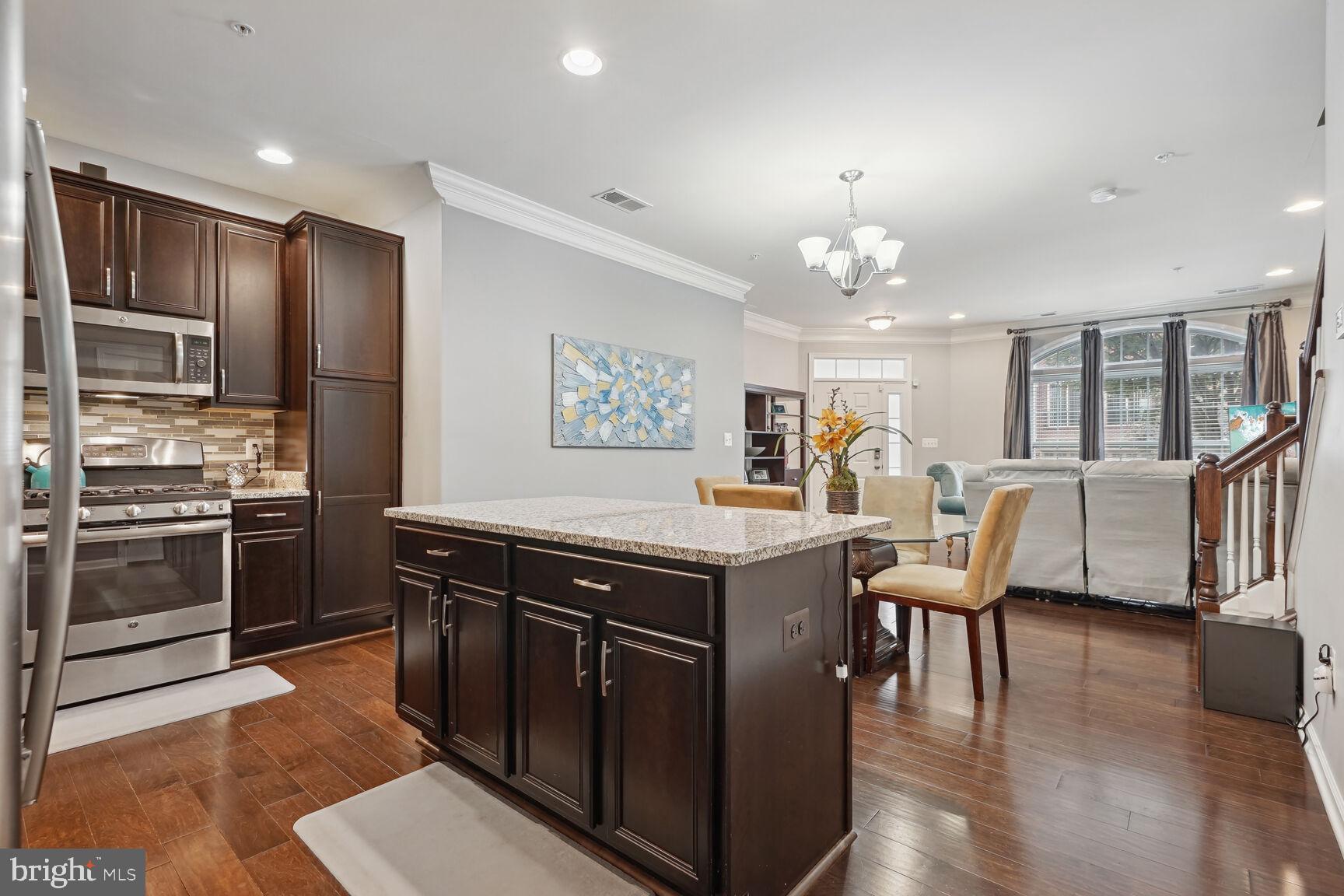 23485 Logans Ridge Terrace Ashburn, VA 20148 - Photo 4 of 13 Island in kitchen w/breakfast counter