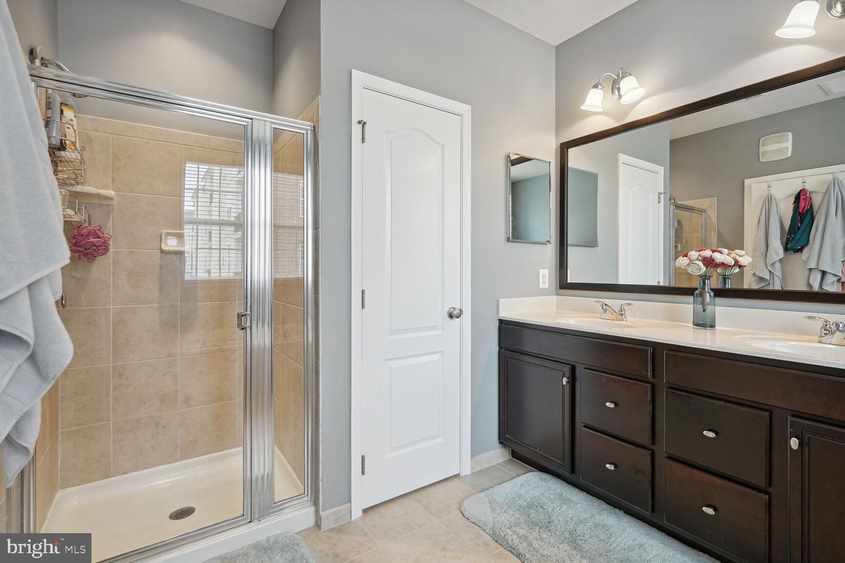 23485 Logans Ridge Terrace Ashburn, VA 20148 - Photo 8 of 13 Primary bath w/separate shower & water closet