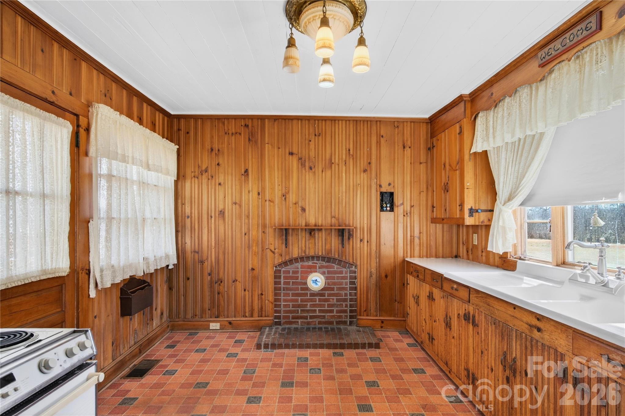 11124 Eastfield Road Huntersville, NC 28078 - Photo 18 of 42 a bathroom with a sink a mirror and a shower