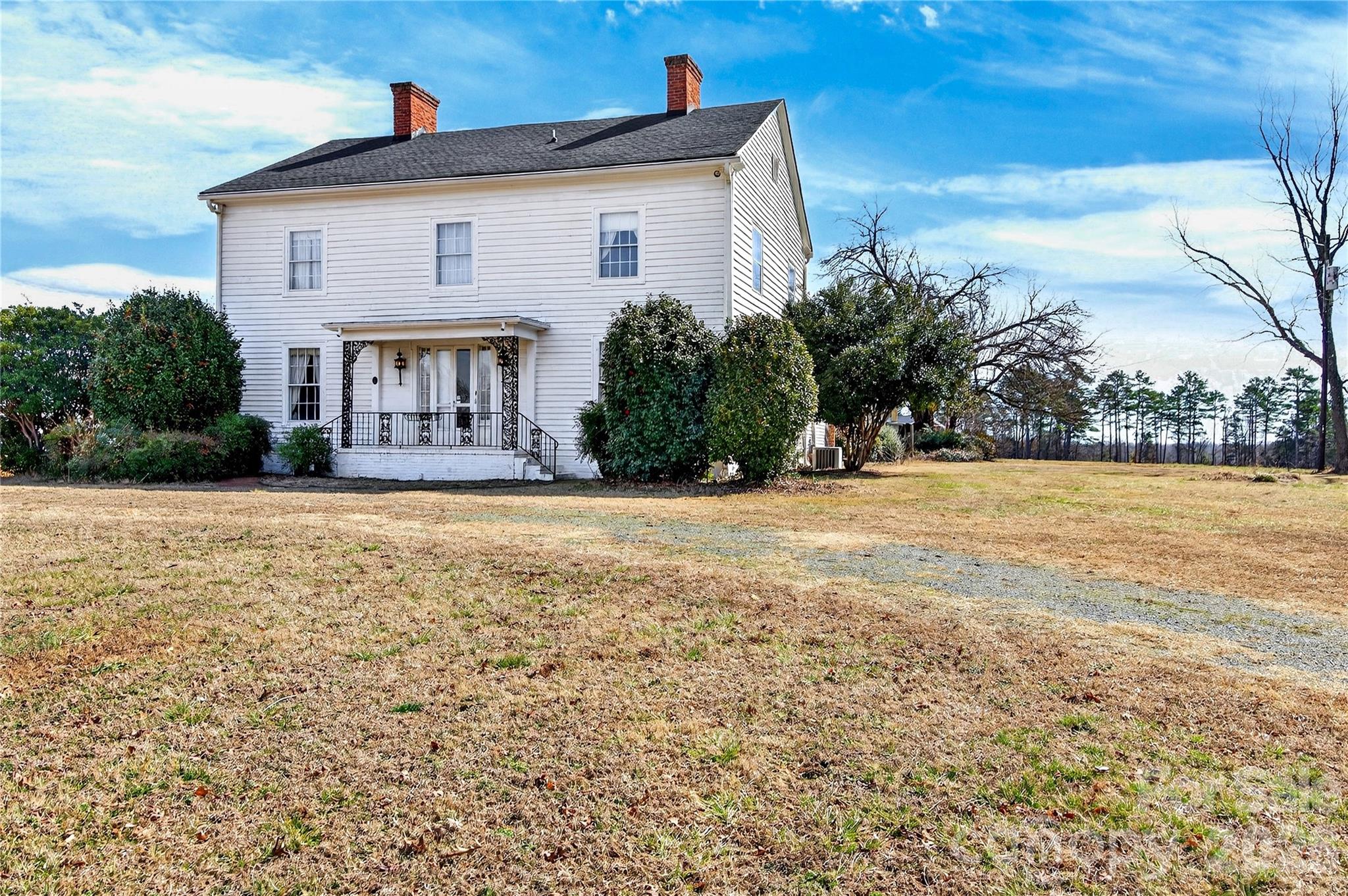 11124 Eastfield Road Huntersville, NC 28078 - Photo 2 of 42 a front view of house with yard and trees around