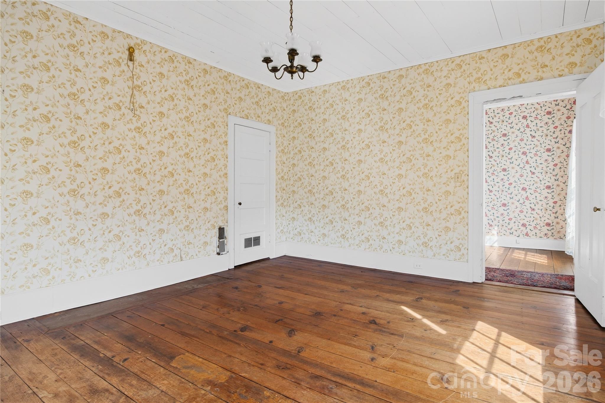 11124 Eastfield Road Huntersville, NC 28078 - Photo 24 of 42 a view of empty room with wooden floor and fan