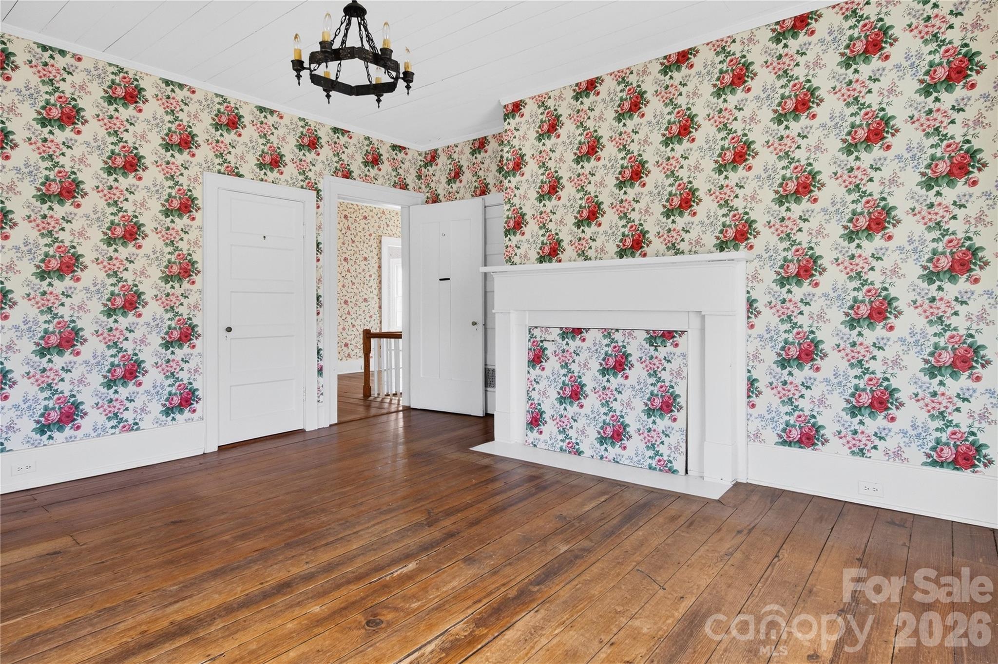 11124 Eastfield Road Huntersville, NC 28078 - Photo 29 of 42 a view of a hallway with paintings on the wall