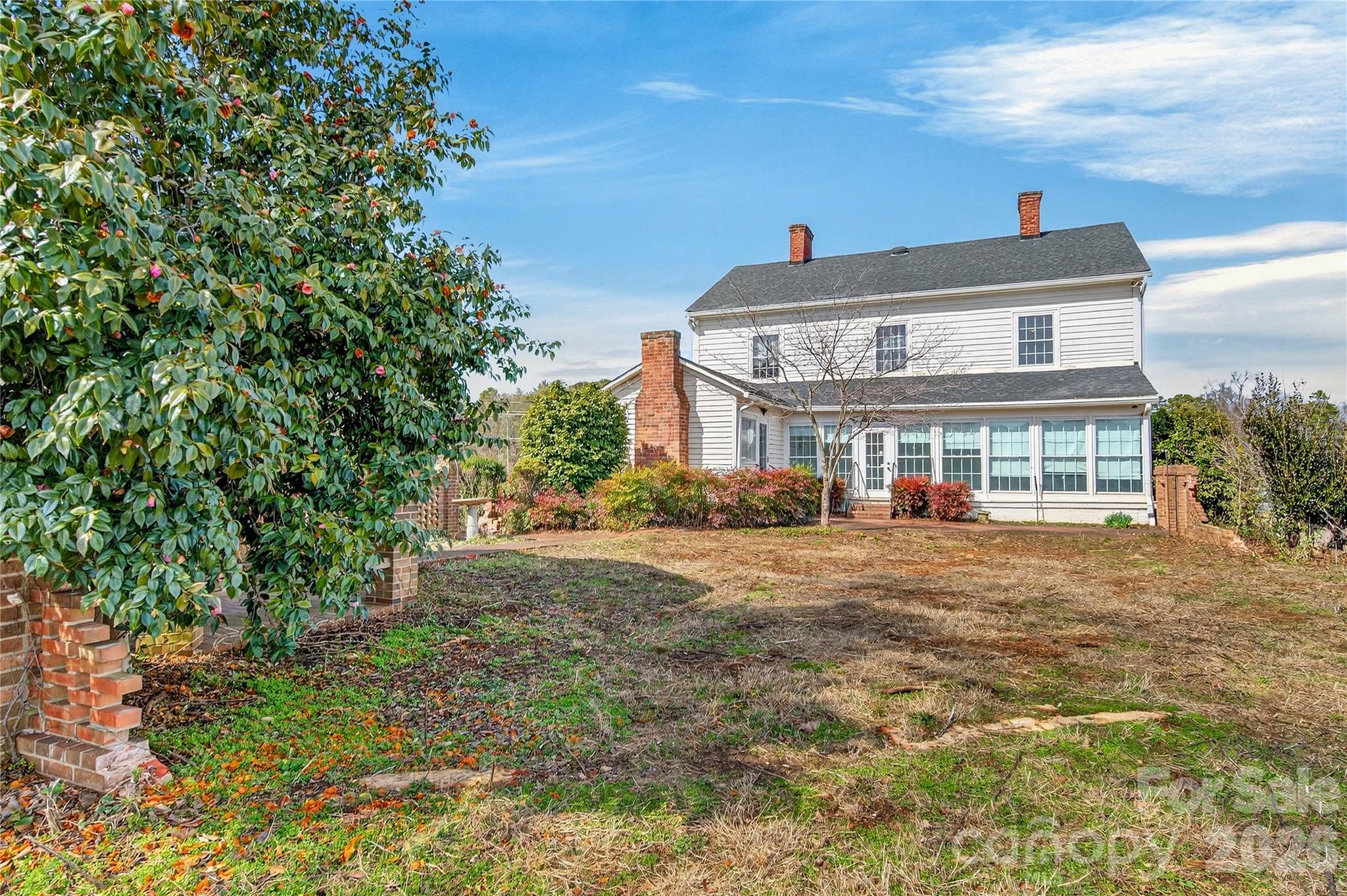 11124 Eastfield Road Huntersville, NC 28078 - Photo 33 of 42 a front view of a house with a yard