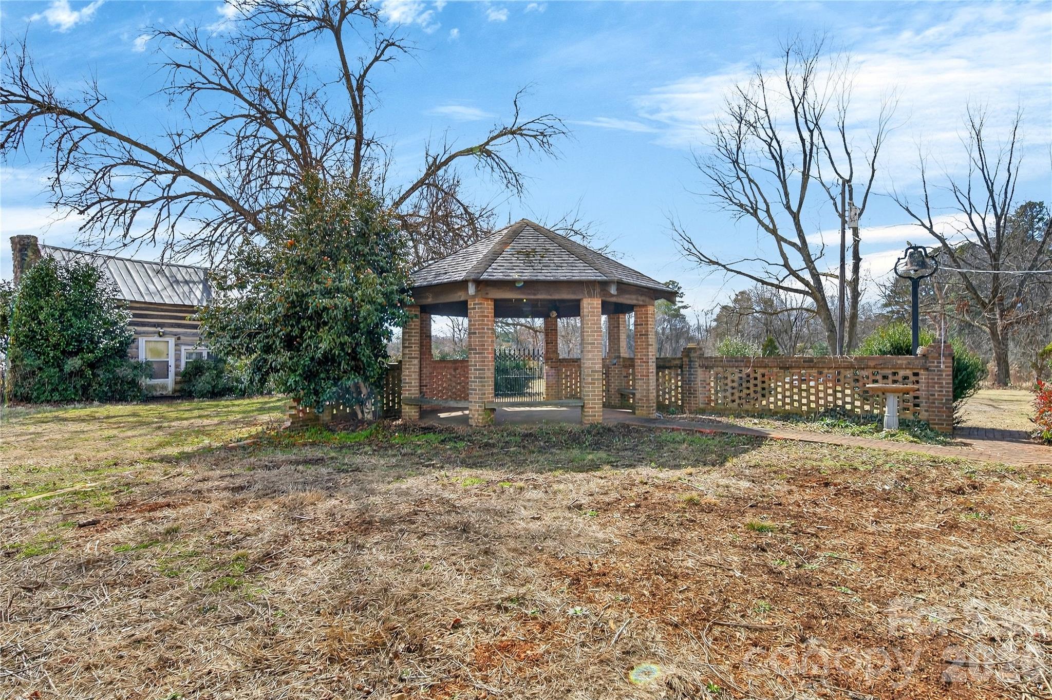 11124 Eastfield Road Huntersville, NC 28078 - Photo 34 of 42 a front view of a house with a yard