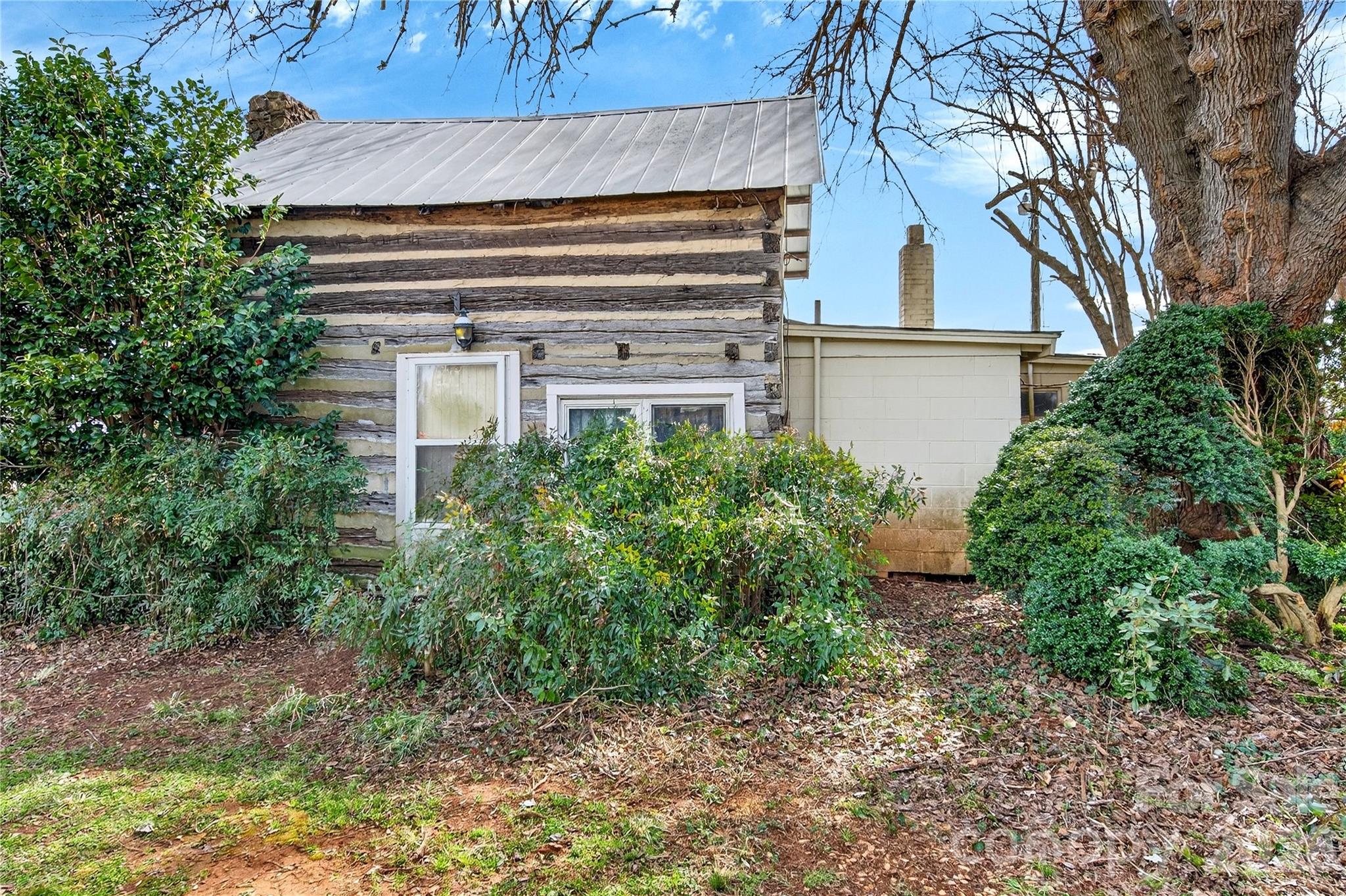 11124 Eastfield Road Huntersville, NC 28078 - Photo 36 of 42 a view of a house with a yard and plants