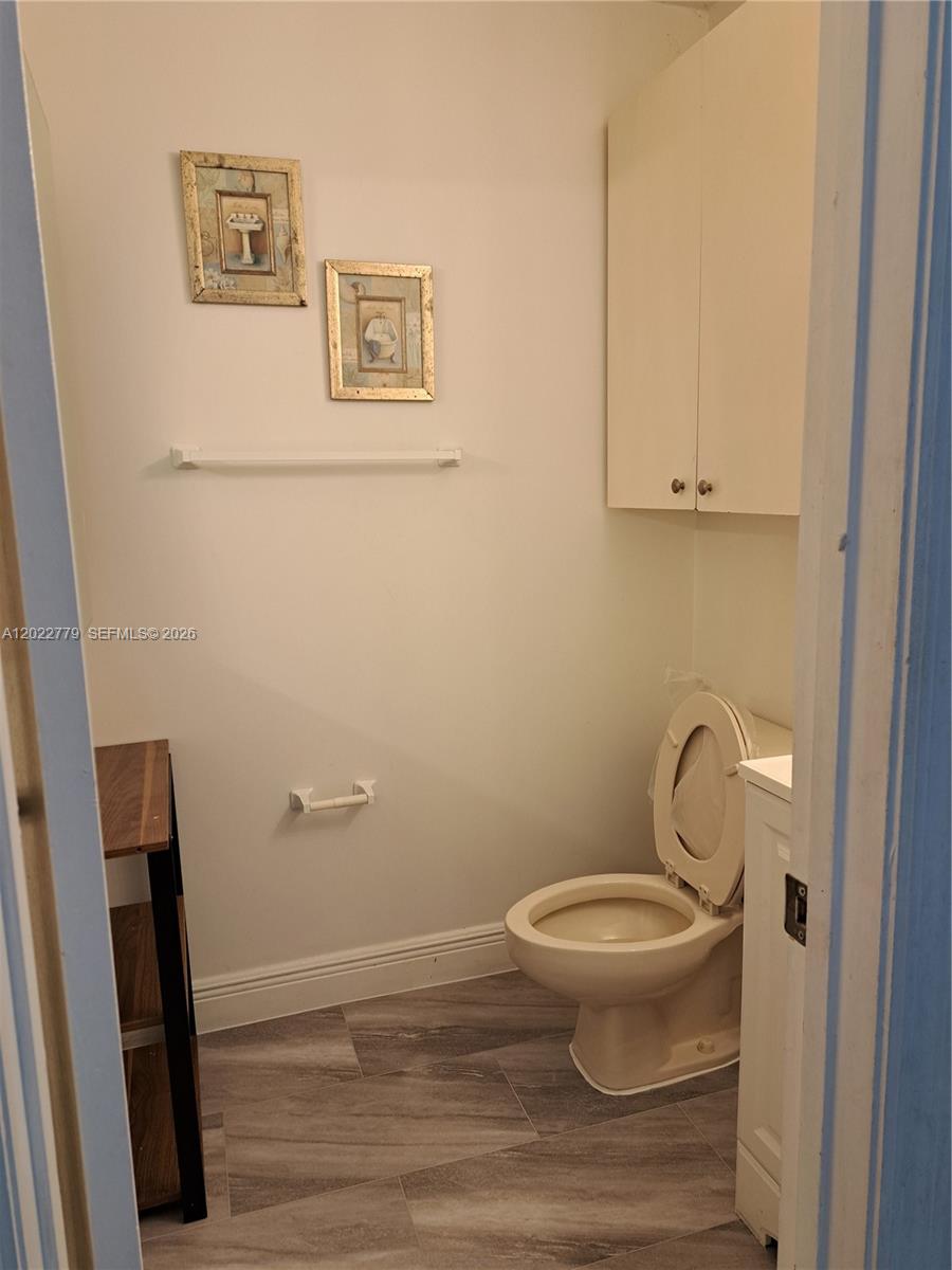 6140 Southwest 129th Place, Unit 2007 Miami, FL 33183 - Photo 7 of 21 Downstairs Half Bathroom