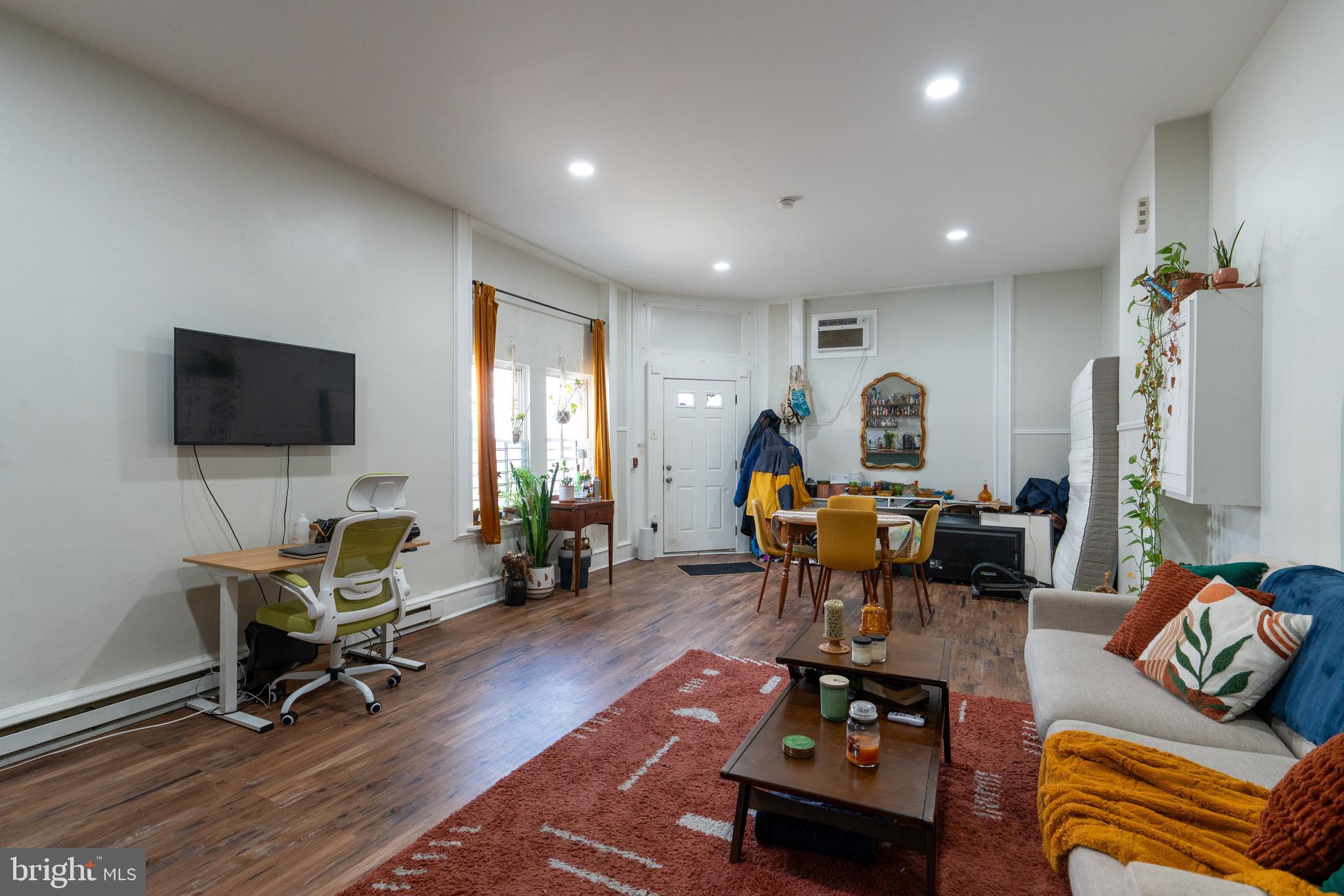 1900 South 18th Street Philadelphia, PA 19145 - Photo 4 of 15 a living room with furniture and a flat screen tv