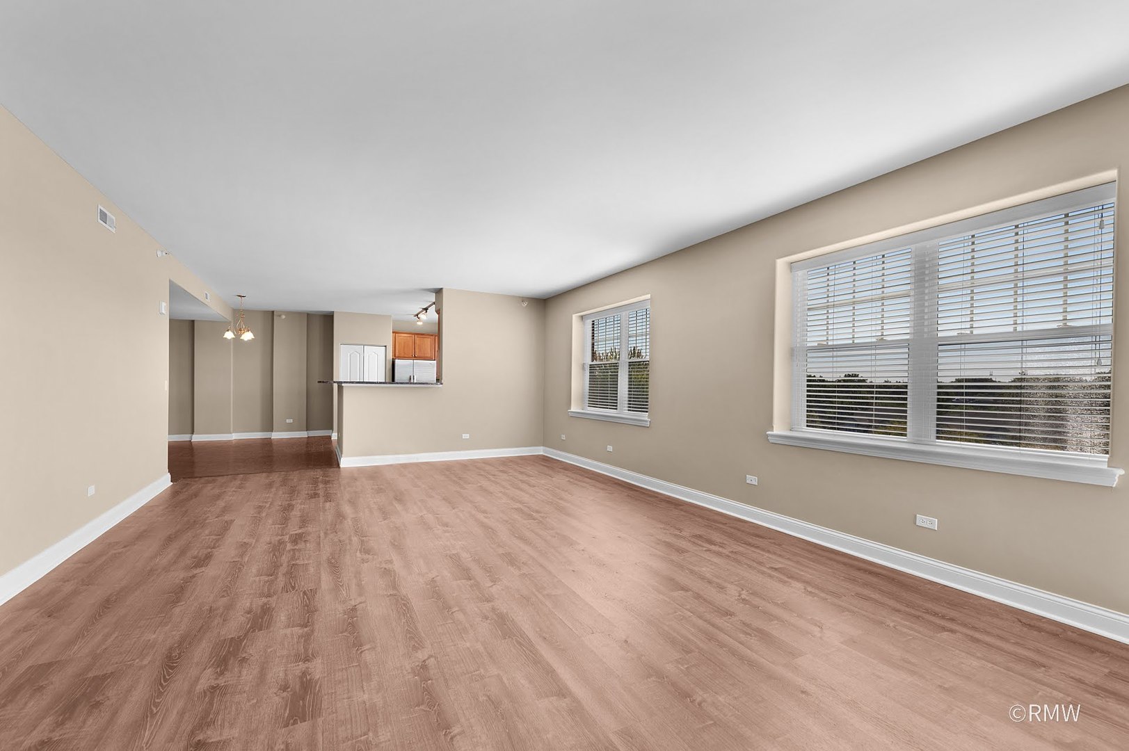 2 Itasca Place, Unit 419 Addison, IL 60143 - Photo 12 of 21 wooden floor in an empty room with a window