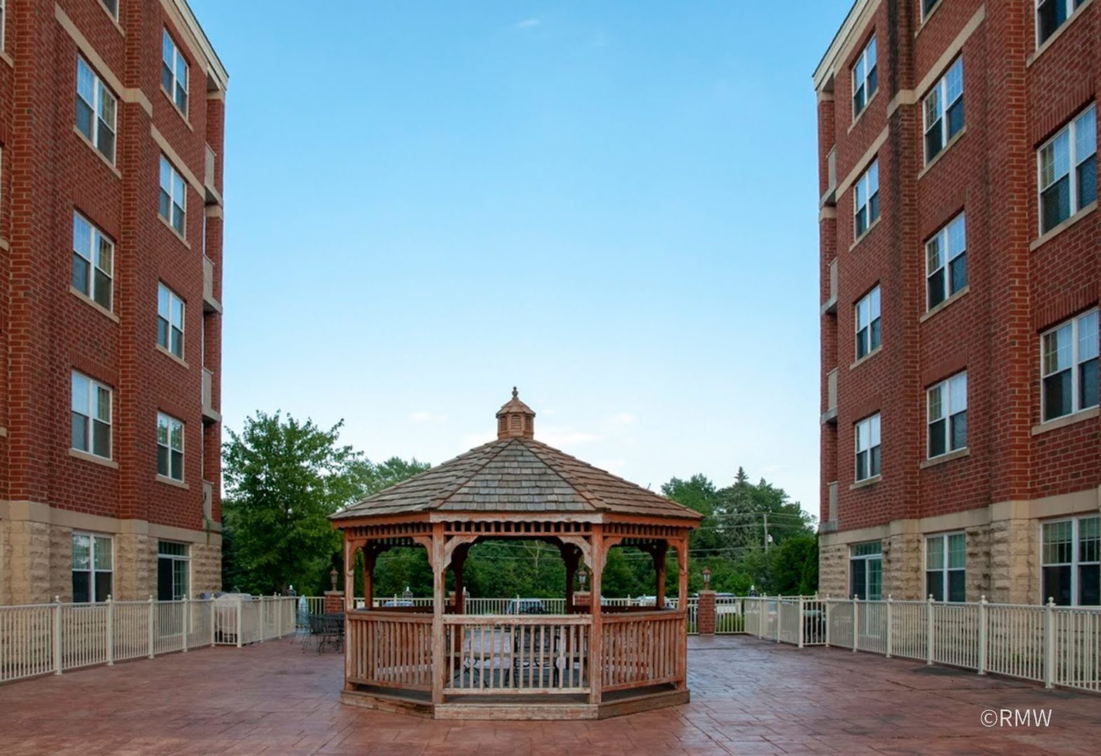 2 Itasca Place, Unit 419 Addison, IL 60143 - Photo 2 of 21 a front view of a building with garden