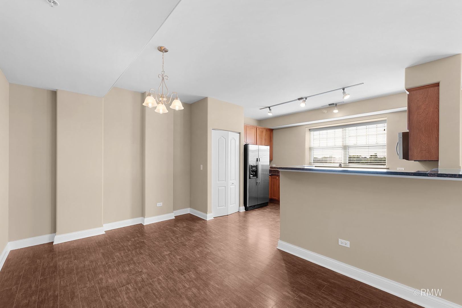 2 Itasca Place, Unit 419 Addison, IL 60143 - Photo 7 of 21 a view of a kitchen with a dishwasher and a window