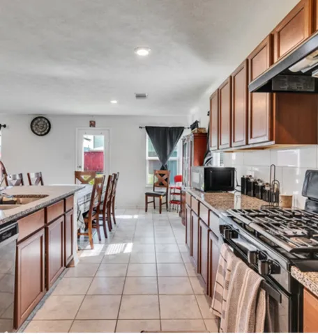 $395,000 | 14614 Monterey Cypress Drive, Houston, TX 77068