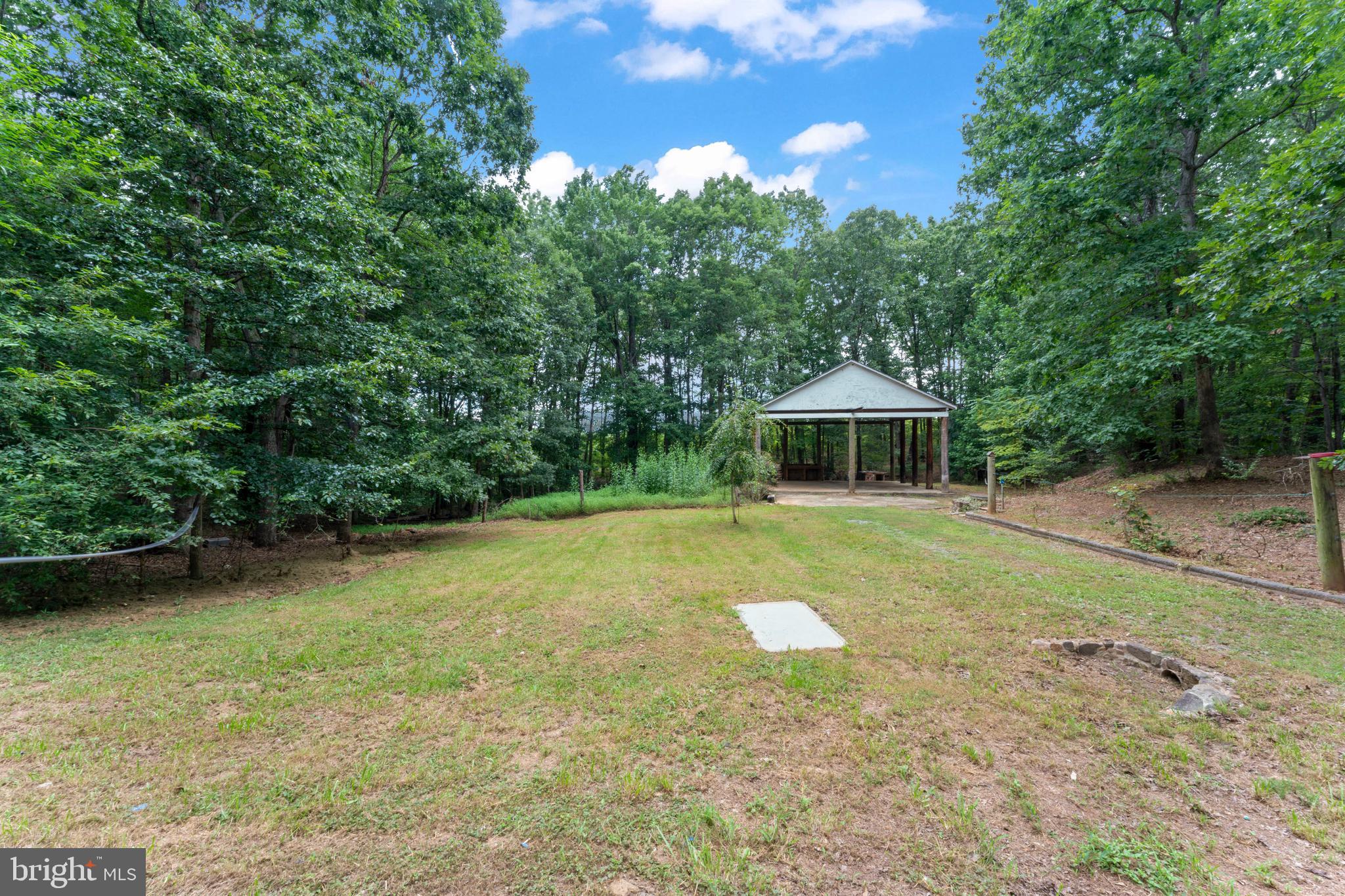 1543 Vawter Corner Road Louisa, VA 23093 - Photo 13 of 43 a front view of a house with a yard