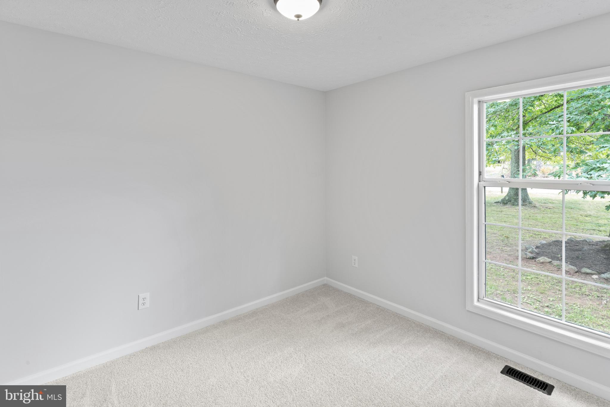 1543 Vawter Corner Road Louisa, VA 23093 - Photo 30 of 43 an empty room with a window